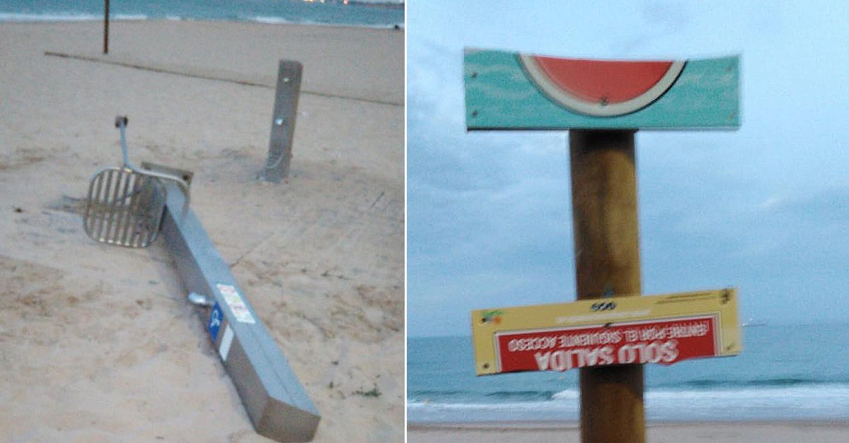 Actos vandálicos en la bajada de la playa de Las Redes: ducha arrancada y cartelería dañada